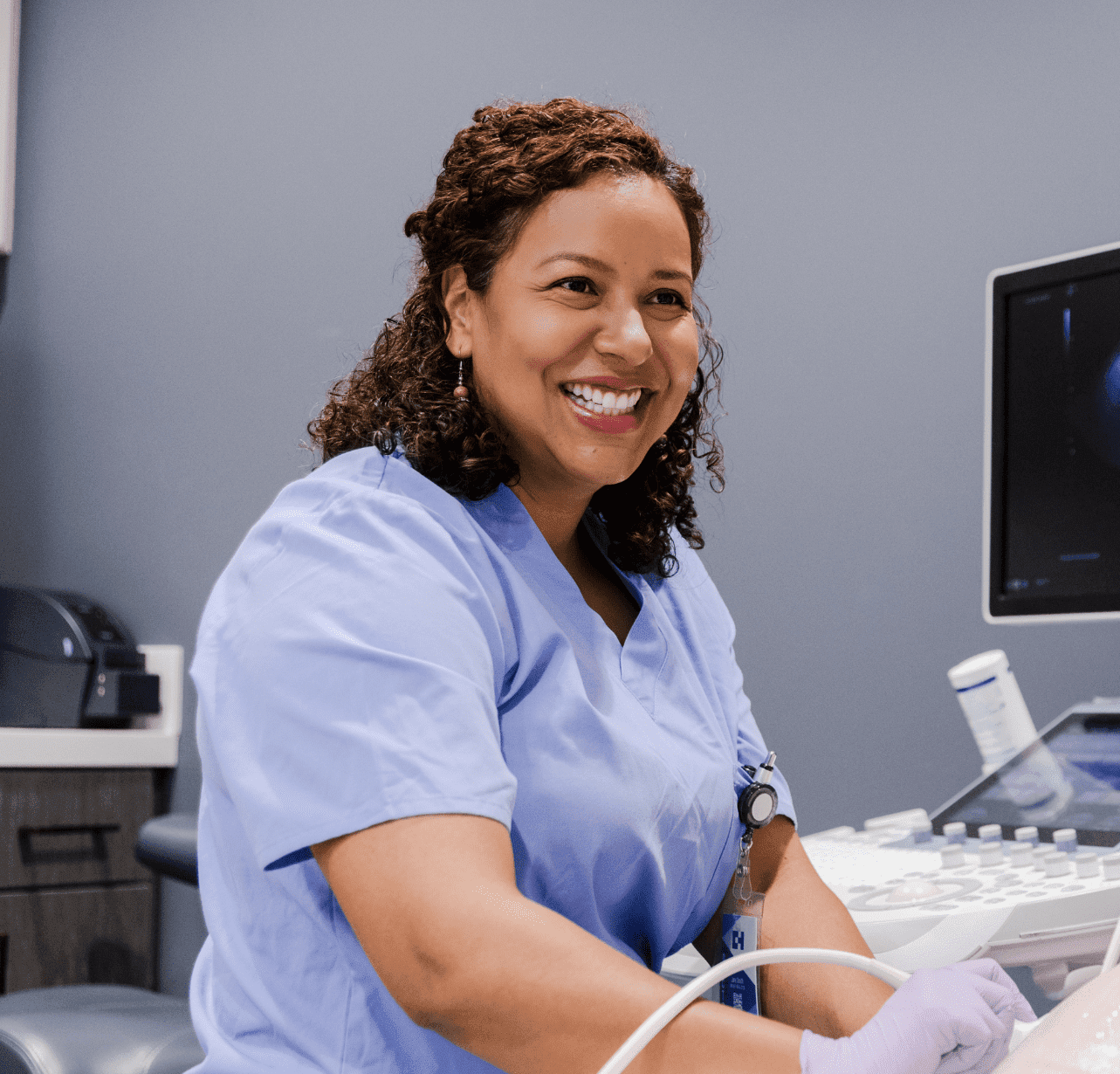 Doctor giving an ultrasound at Thrive Women's Clinic in Orlando, FL